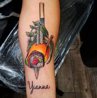 chef knife tattoo on the forearm