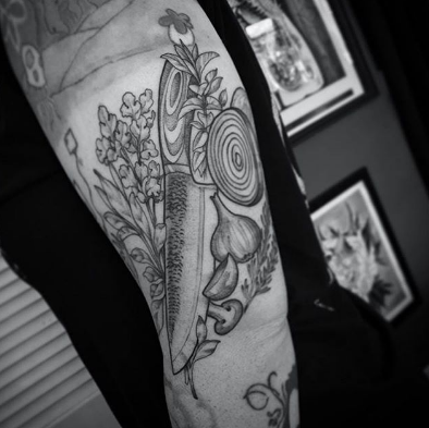 chef knife arm tattoo