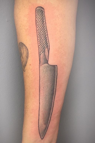 chef knife forearm tattoo