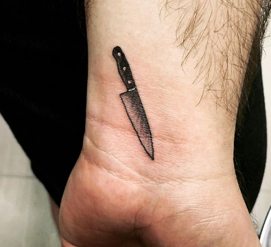chef knife wrist tattoo