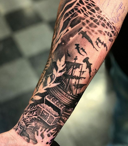 the pirate's treasure forearm tattoo