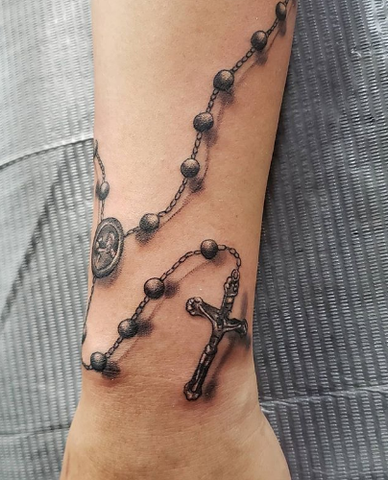 RafaTattoo  Rosary tattoo Hand tattoos Rosary tattoo wrist