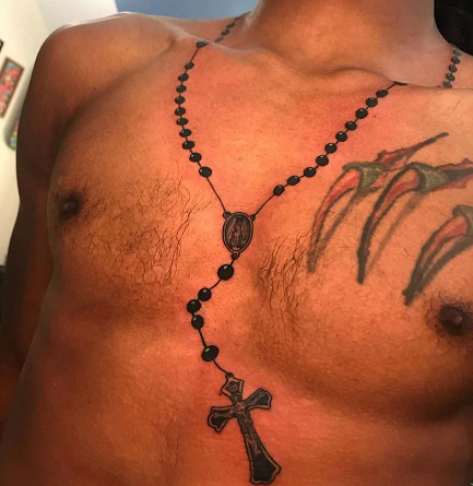 rosary chest tattoo
