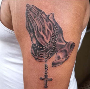 rosary arm tattoo