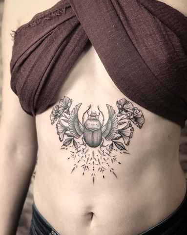 scarab tattoo on the belly