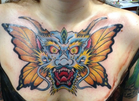 Butterfly and Dragon Tattoo on chest