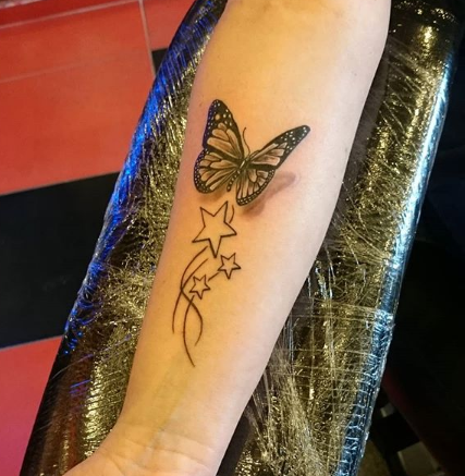 3D Butterfly and Star Tattoo on forearm