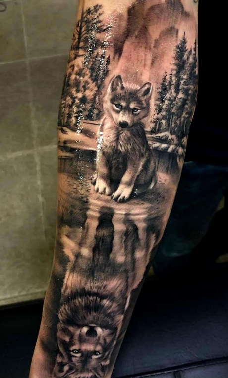 wolf pup sleeve tattoo on arm