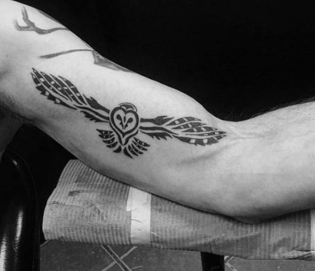 Tribal Owl Tattoo on arm