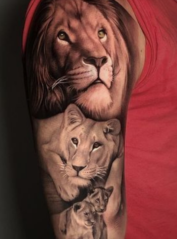 lion and lioness arm tattoo