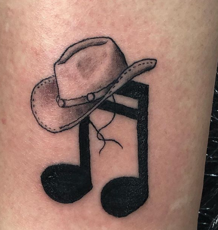cowboy hat with music note tattoo design