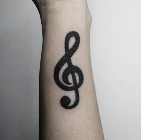 music note forearm tattoo