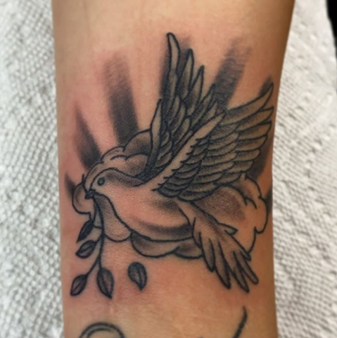 dove with branches tattoo