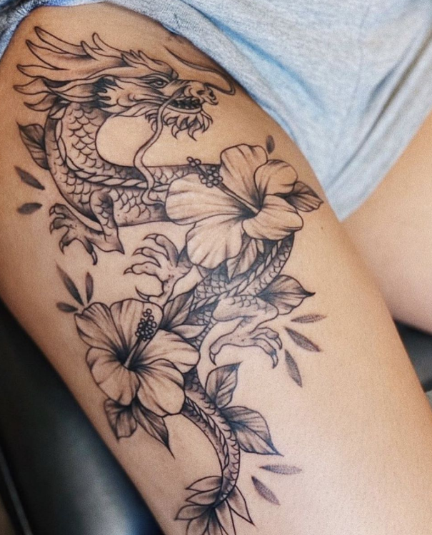 dragon flower thigh tattoo