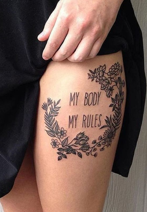 flower word thigh tattoo