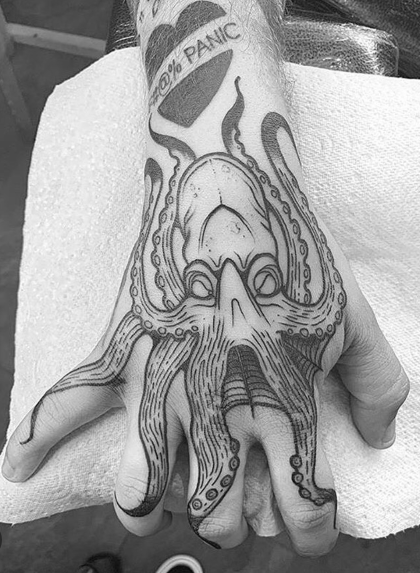 octopus hand tattoo