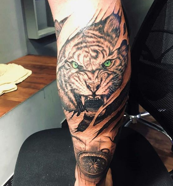3D tiger tattoo on forearm