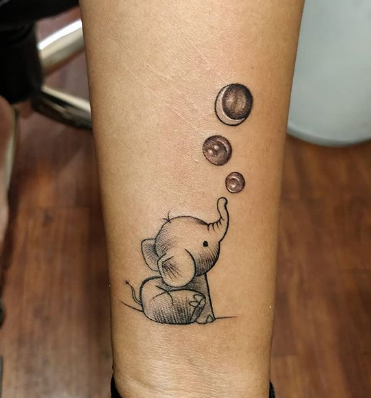 Baby Elephant Tattoo with bubbles