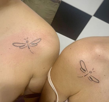 dragonfly tattoo on the shoulder