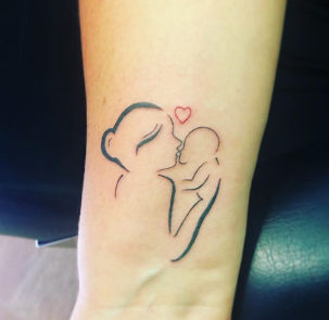 mother holding a baby tattoo