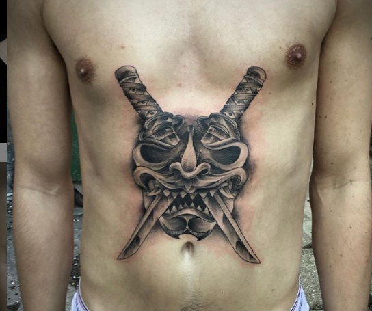 skull stomach belly tattoo