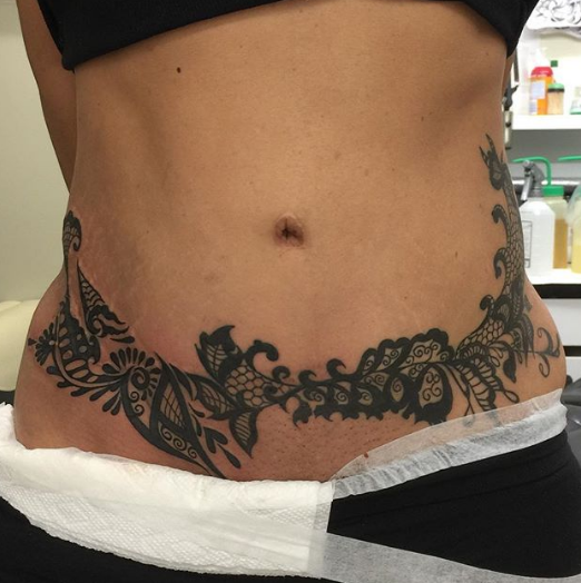 tribal stomach belly tattoo
