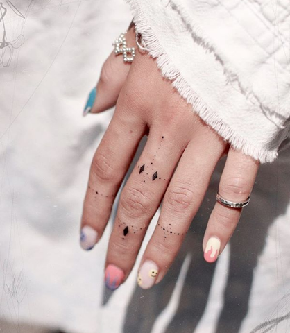 dot finger tattoo for grils women