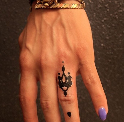 floral ring finger tattoo for men and women