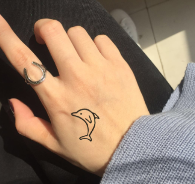 dolphin tiny tattoo for girls