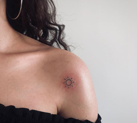 tiny sun tattoo for girls