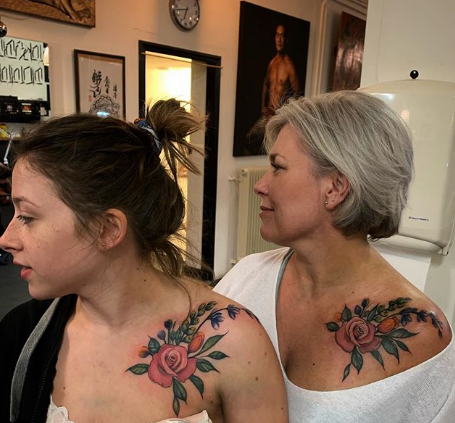flower tattoo on shoulder for mother and daughter
