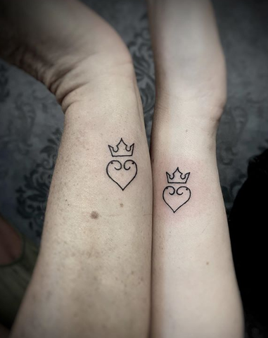 crown heart tattoo on wrist for mother and daughter