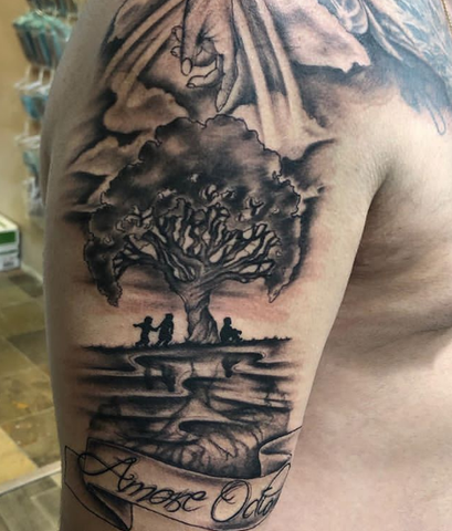 tree of life tattoo with humans and clouds