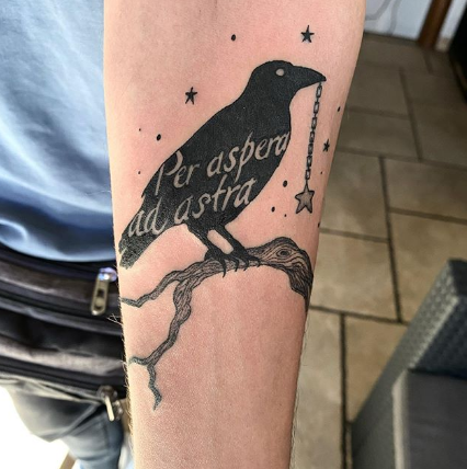 crow forearm tattoo