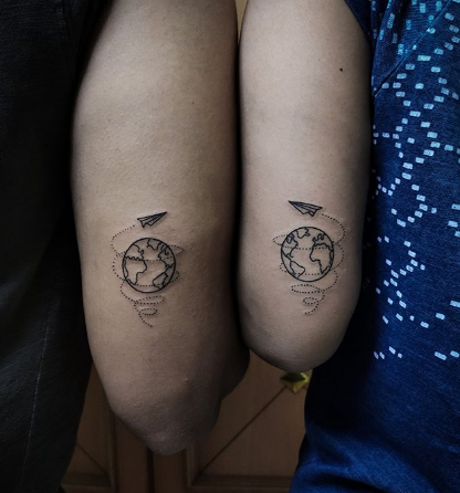 matching couple earth tattoo