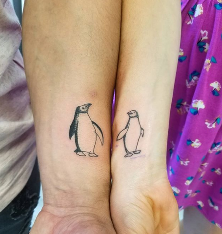 matching couple penguin tattoo