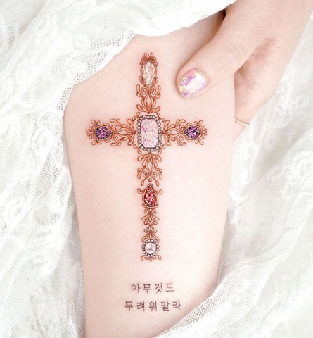diamond cross thigh tattoo