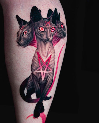 three-headed Bastet cat tattoo