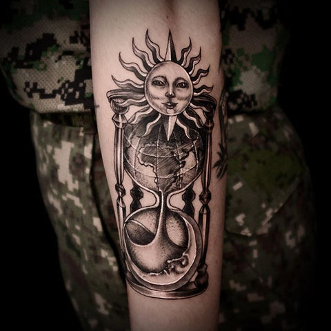 sand hourglass sun tattoo