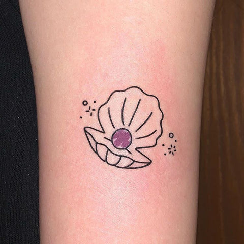 seashell pearl tattoo design