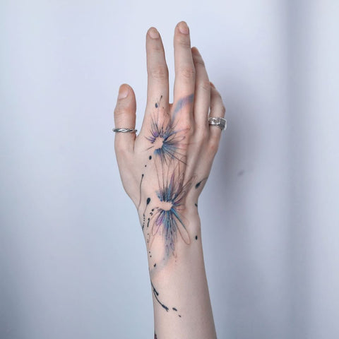 colored line hand tattoo