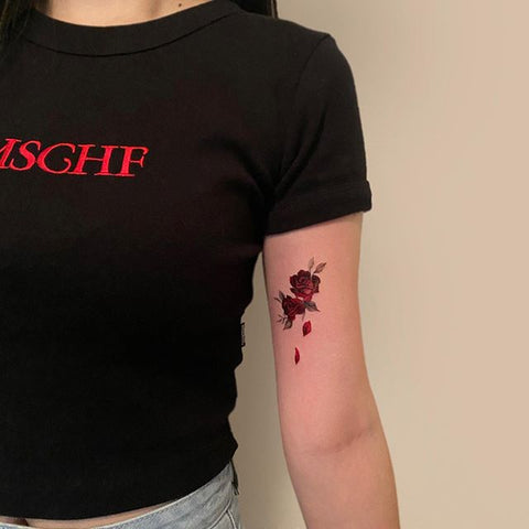flower rose arm tattoo 