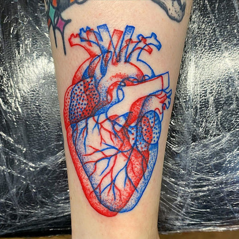 unique heart forearm tattoo