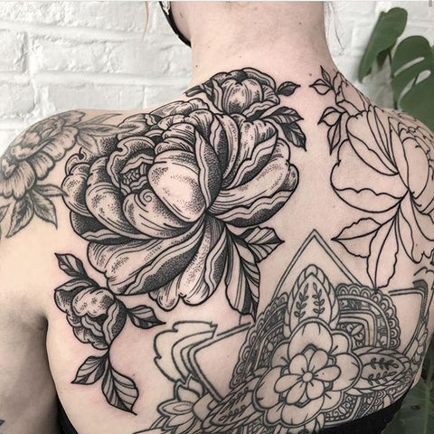 flower floral back tattoo