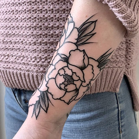 flower rose wrist tattoo