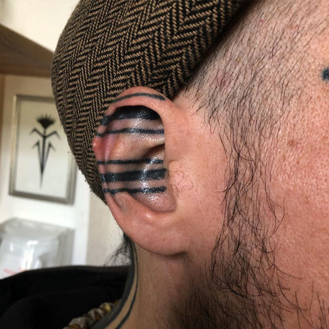 line ear tattoo