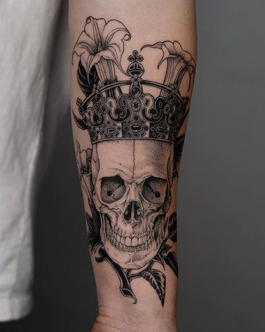 skull with crown tattoo