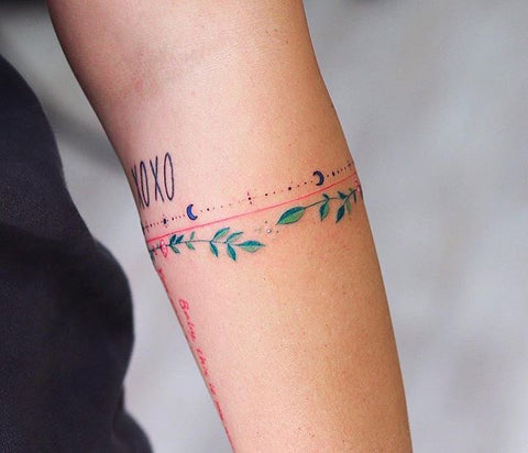 simple line leaf forearm tattoo design