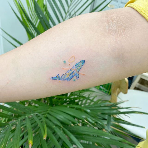 simple dolphin forearm tattoo design