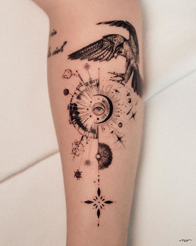 eagle sun tattoo on the forearm
